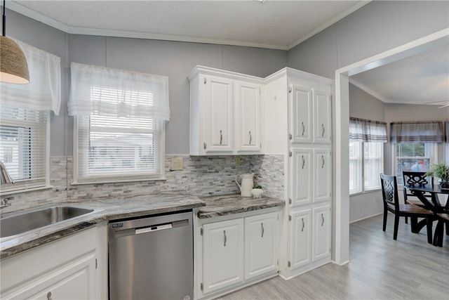 572 Dolphin Circle, Barefoot Bay, FL 32976