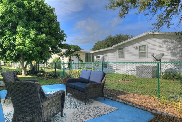 572 Dolphin Circle, Barefoot Bay, FL 32976