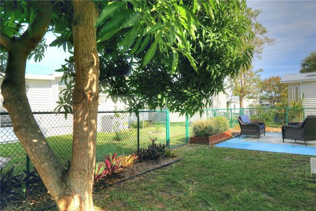 572 Dolphin Circle, Barefoot Bay, FL 32976