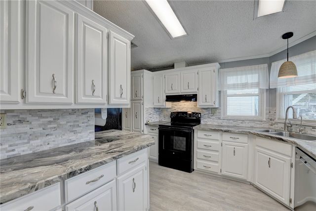 572 Dolphin Circle, Barefoot Bay, FL 32976