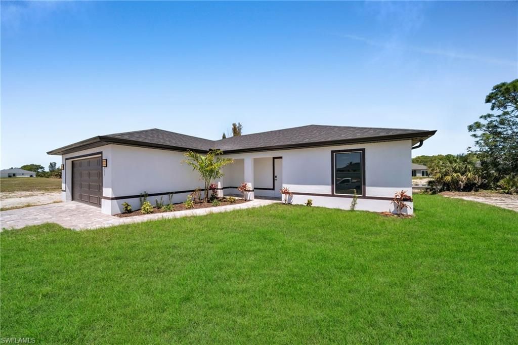 311 NE 31st ST, CAPE CORAL, FL 33909 — photo 2