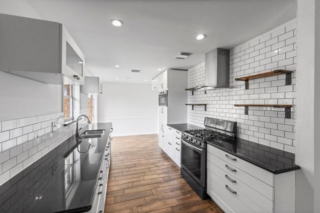 9735 Kemp Forest Drive, Houston, TX 77080