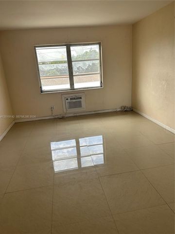 1050 E Sample Rd 208, Pompano Beach, FL 33064