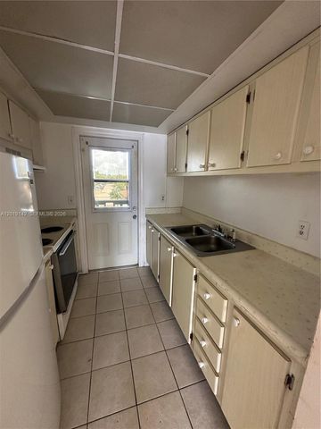 1050 E Sample Rd 208, Pompano Beach, FL 33064