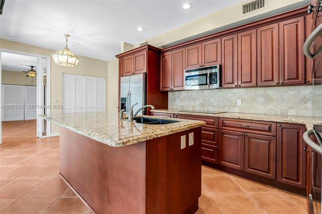 1051 W Bel Aire Drive W, Pembroke Pines, FL 33027