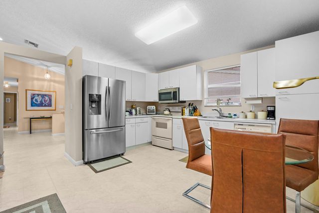 7851 Oak Grove Circle, Lake Worth, FL 33467