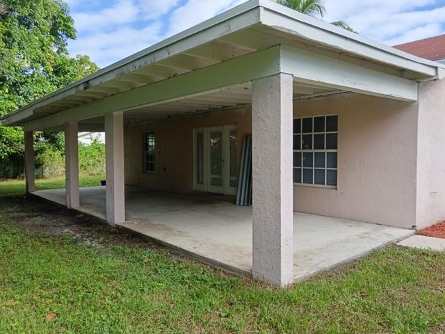 1704 Boardman Avenue, Mangonia Park, FL 33407