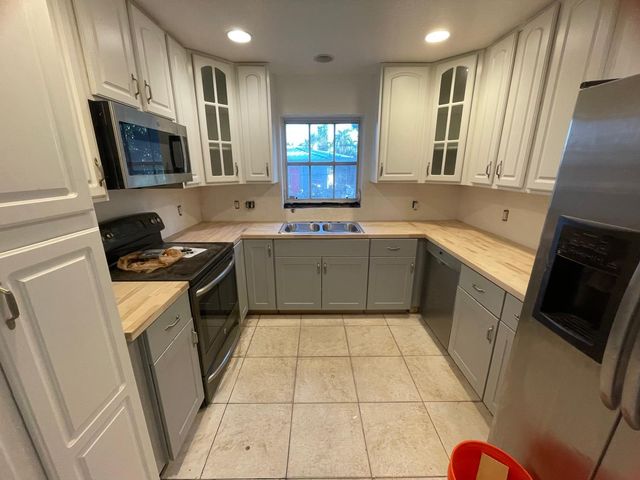 1704 Boardman Avenue, Mangonia Park, FL 33407