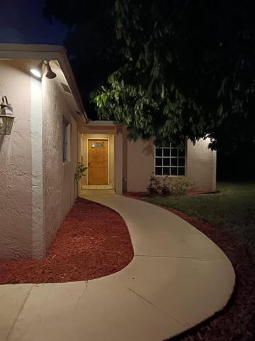 1704 Boardman Avenue, Mangonia Park, FL 33407