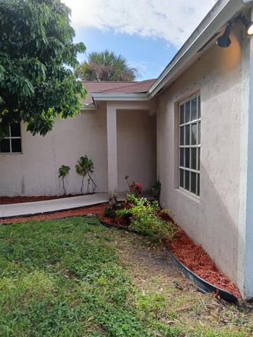 1704 Boardman Avenue, Mangonia Park, FL 33407