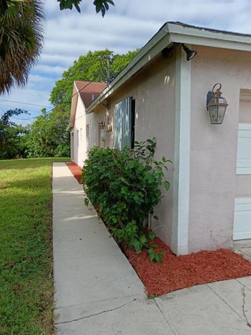 1704 Boardman Avenue, Mangonia Park, FL 33407