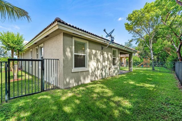 5613 Caranday Palm Drive, Greenacres, FL 33463