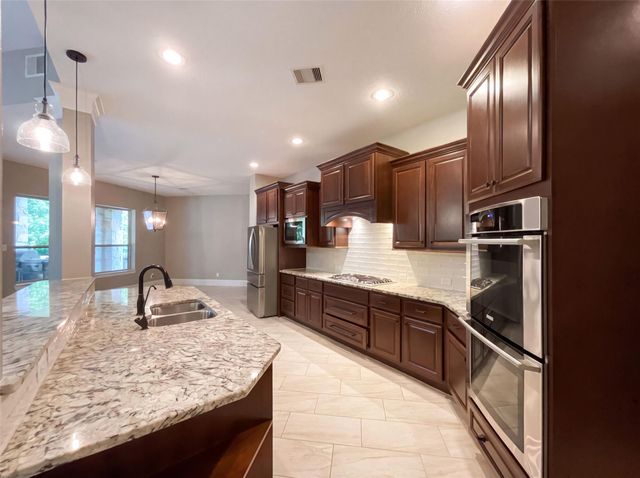 31403 Imperial Bluff Court, Spring, TX 77386