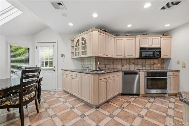 23 Maytime Court, Jericho, NY 11753