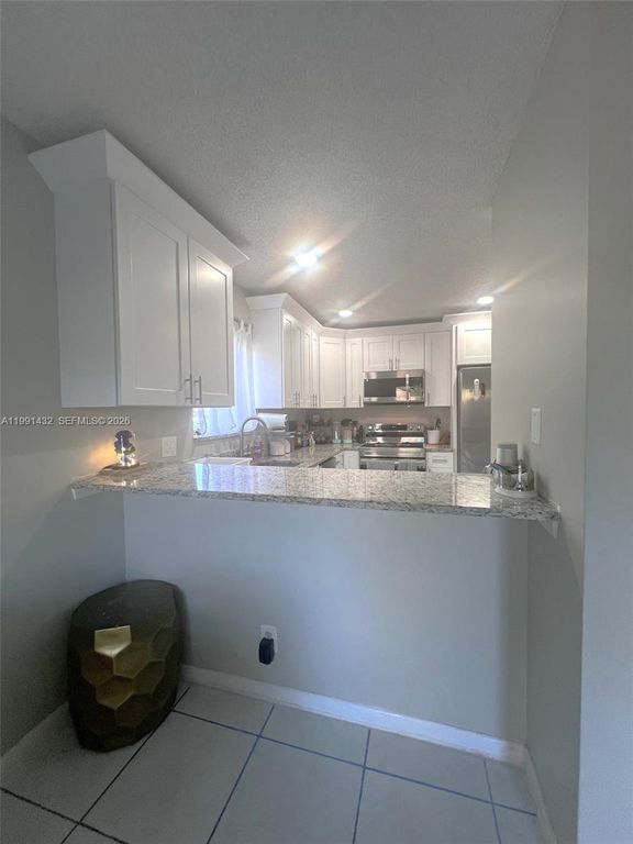 Image 7 of property listing at 4681 Cherry Rd, West Palm Beach, FL 33417