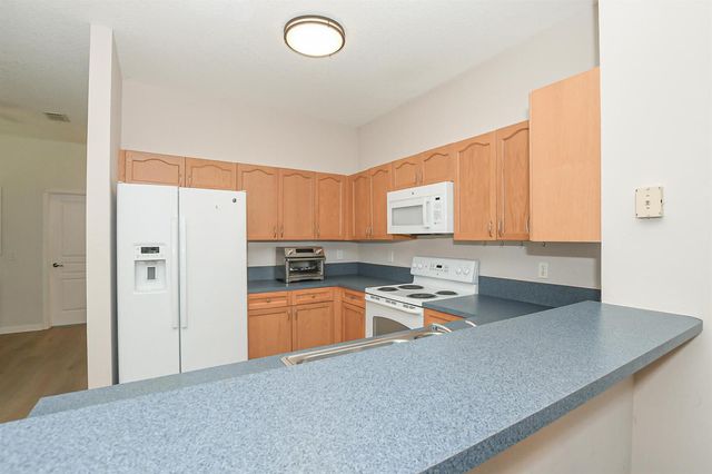 649 NE Bent Paddle Lane, Port St. Lucie, FL 34983