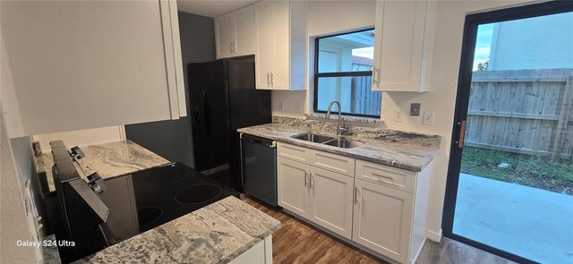 6299 ARLINGTON COURT 212, Orlando, FL 32807