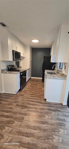 6299 ARLINGTON COURT 212, Orlando, FL 32807