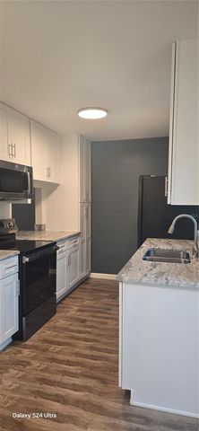 6299 ARLINGTON COURT 212, Orlando, FL 32807