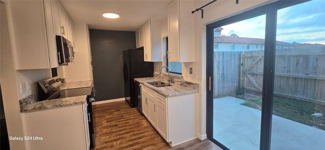 6299 ARLINGTON COURT 212, Orlando, FL 32807