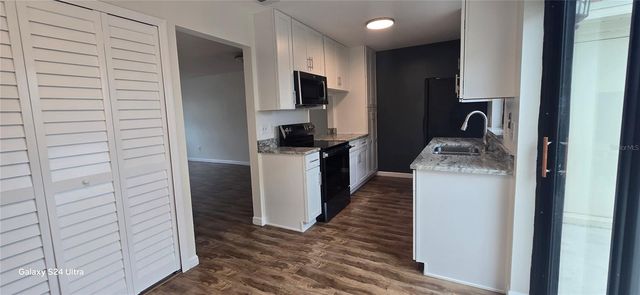 6299 ARLINGTON COURT 212, Orlando, FL 32807