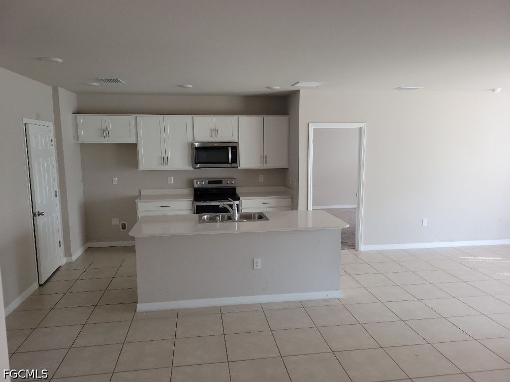 Image 2 of property listing at 334 Kismet PKWY E, Cape Coral, FL 33909