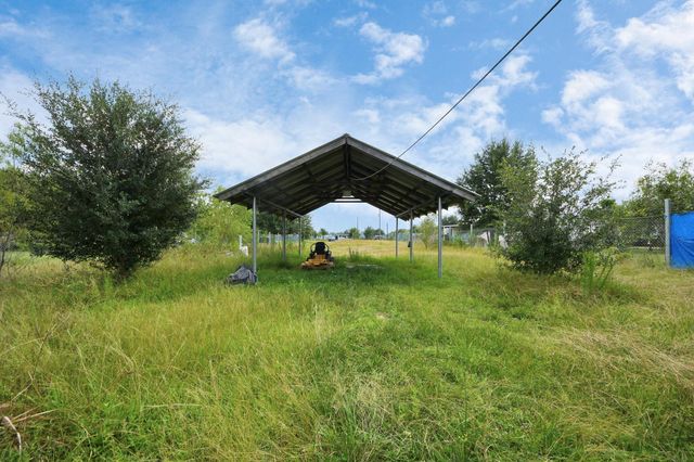 771 County Road 3558, Cleveland, TX 77327