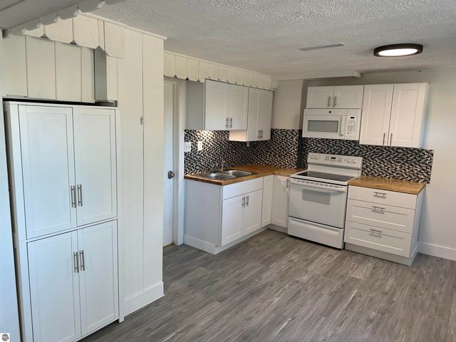 7075 E M 72, Williamsburg, MI 49690