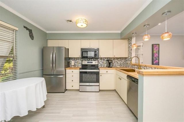 25492 Cockleshell DR # 102, Bonita Springs, FL 34135