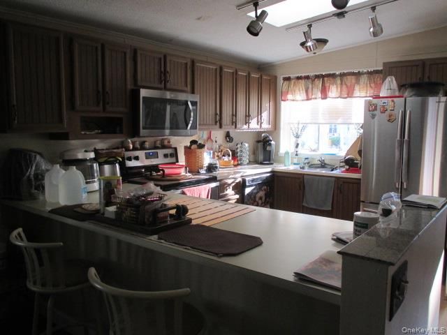 130 Village Circle W, Manorville, NY 11949