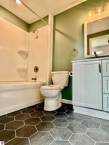 7160 W Cherry Avenue, Kewadin, MI 49648