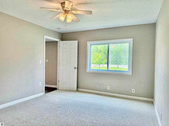 7160 W Cherry Avenue, Kewadin, MI 49648