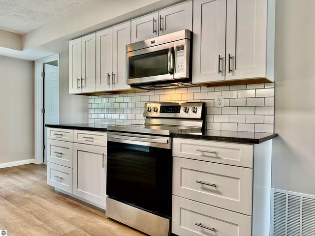 7160 W Cherry Avenue, Kewadin, MI 49648