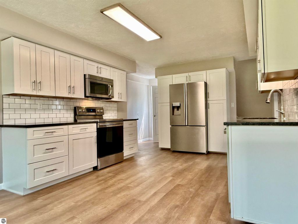 Image 14 of property listing at 7160 W Cherry Avenue, Kewadin, MI 49648