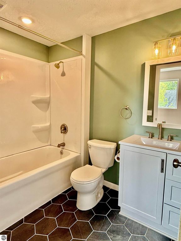 Image 18 of property listing at 7160 W Cherry Avenue, Kewadin, MI 49648