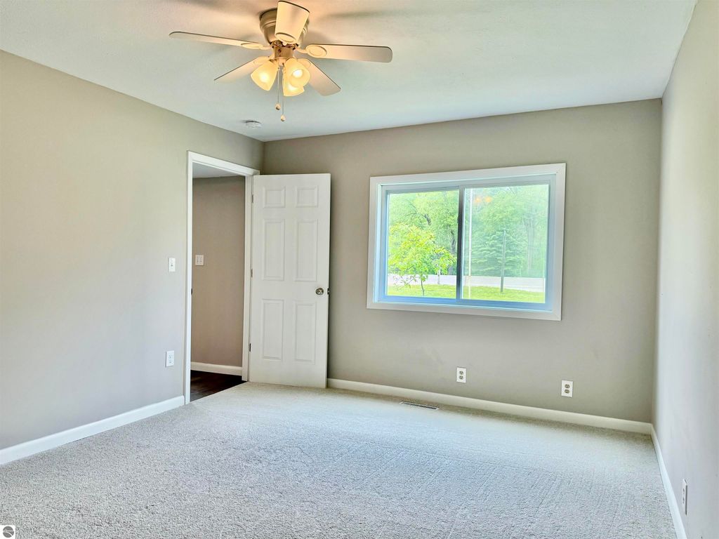 Image 22 of property listing at 7160 W Cherry Avenue, Kewadin, MI 49648