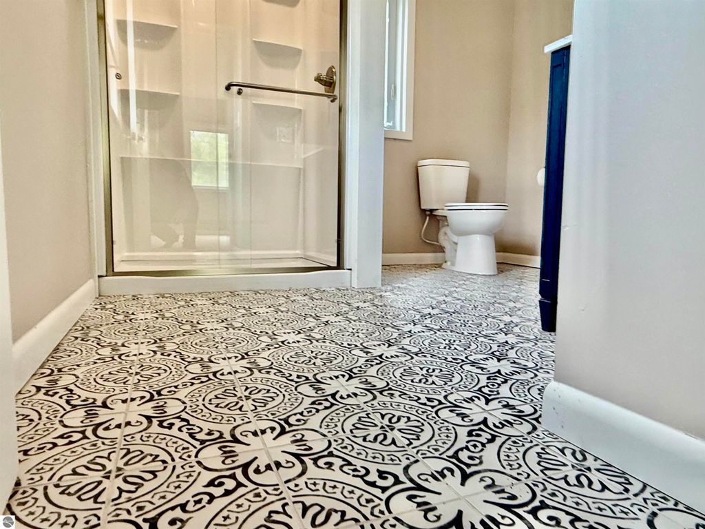 Image 23 of property listing at 7160 W Cherry Avenue, Kewadin, MI 49648