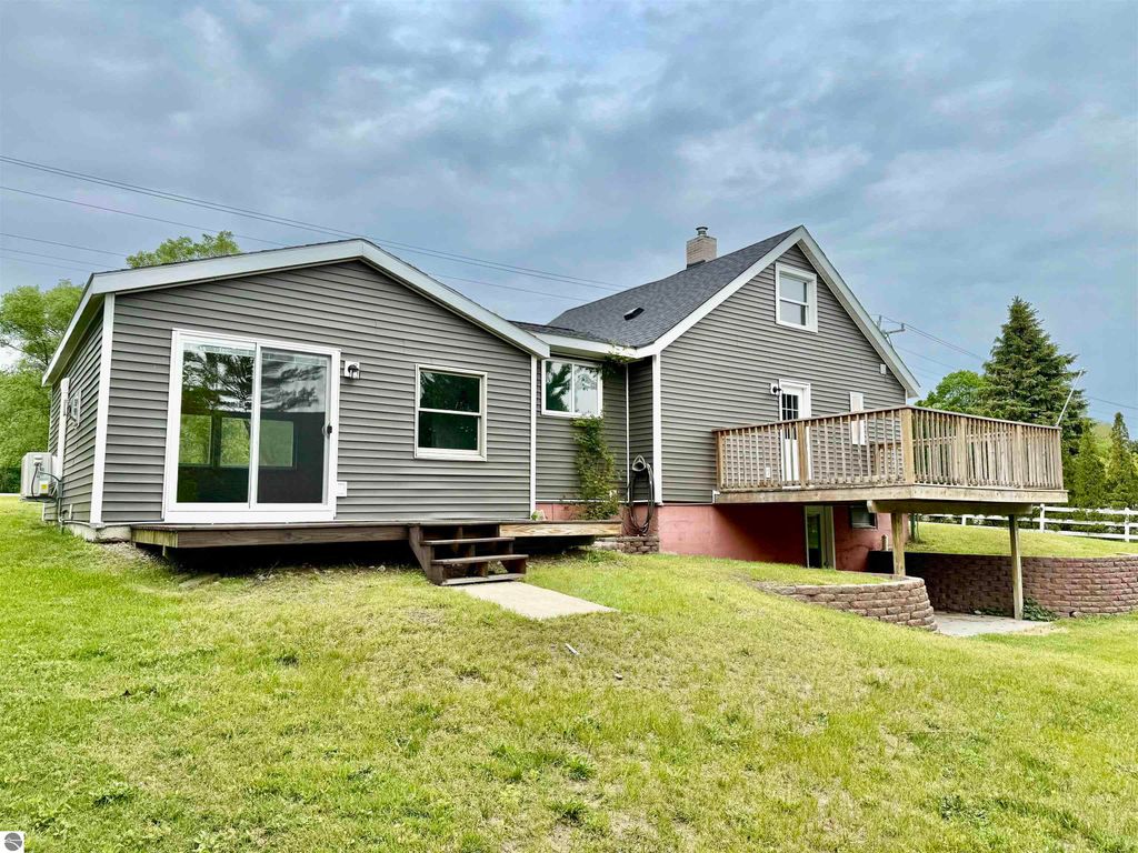 Image 4 of property listing at 7160 W Cherry Avenue, Kewadin, MI 49648