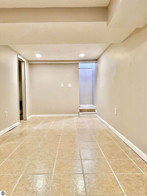 Image 40 of property listing at 7160 W Cherry Avenue, Kewadin, MI 49648