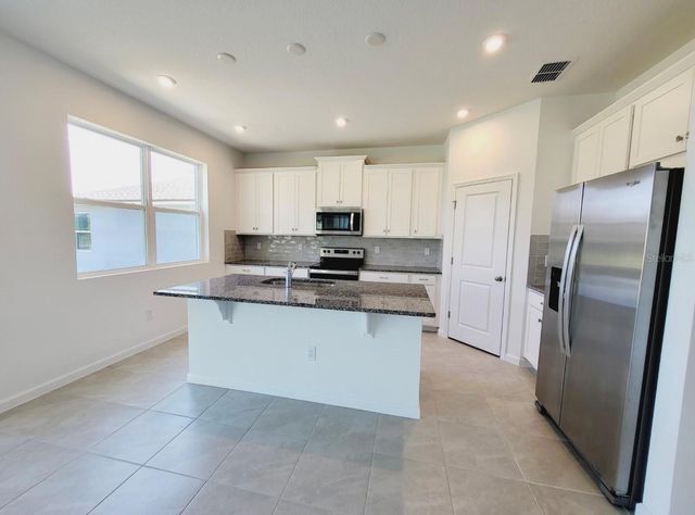 9051 CORAL CAPE STREET, Kissimmee, FL 34747