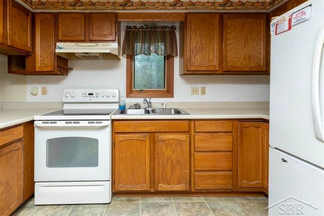 1156 S Alamando Road, Shepherd, MI 48883
