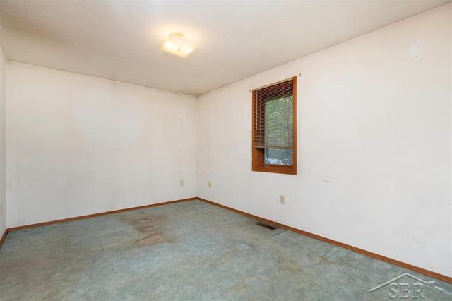 1156 S Alamando Road, Shepherd, MI 48883