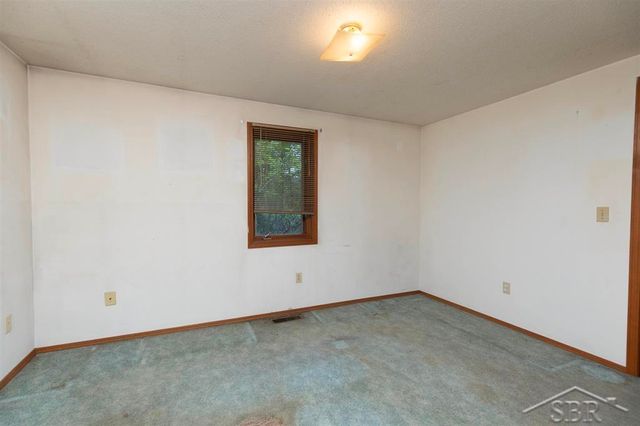 1156 S Alamando Road, Shepherd, MI 48883