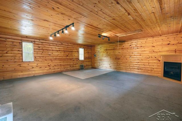 1156 S Alamando Road, Shepherd, MI 48883
