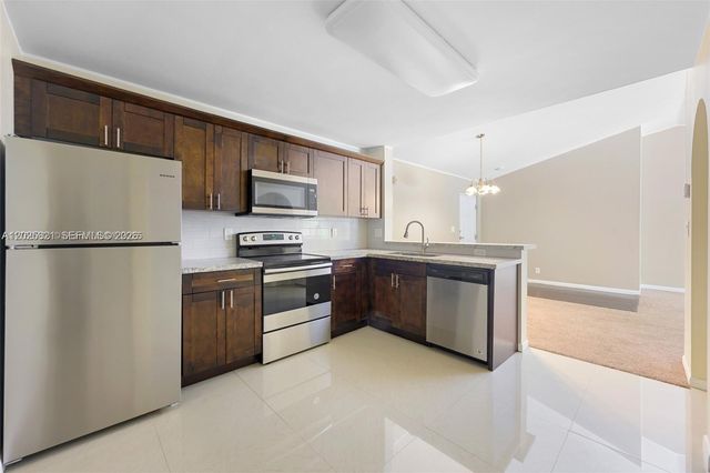 10161 W Sunrise Blvd 304, Plantation, FL 33322