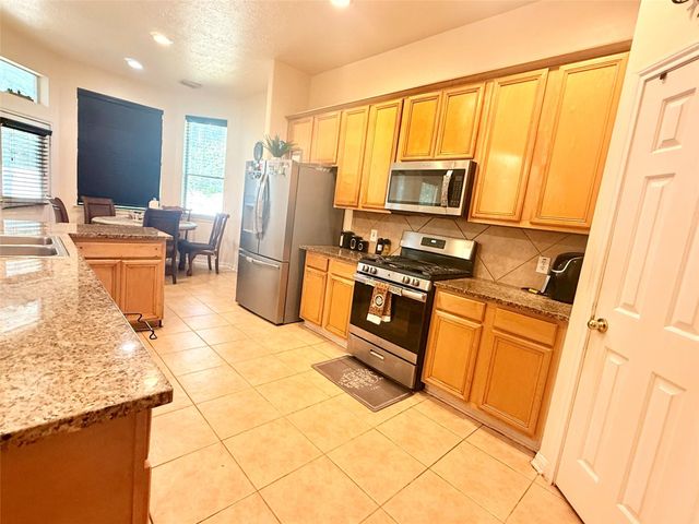 26864 Calgary Pointe Drive, Kingwood, TX 77339