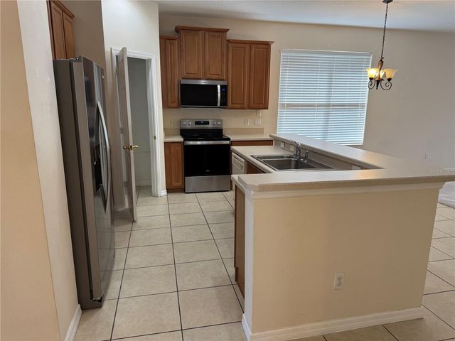 9301 MUSTARD LEAF DRIVE, Orlando, FL 32827