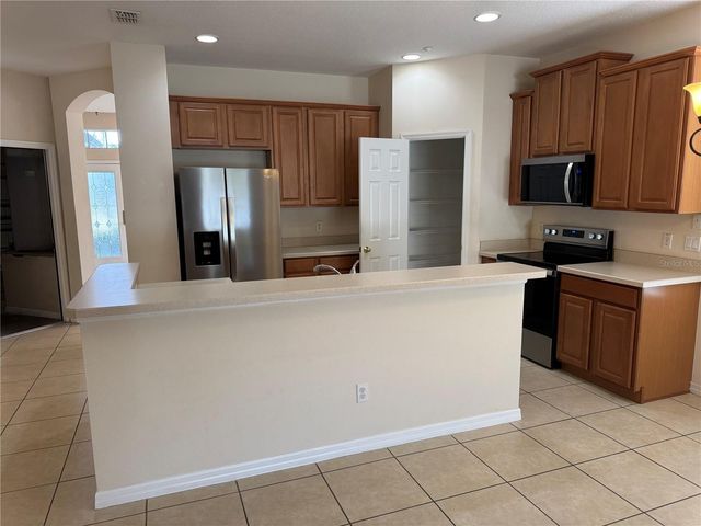 9301 MUSTARD LEAF DRIVE, Orlando, FL 32827