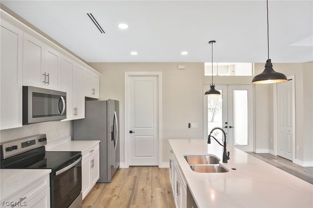 1906 NW 28th AVE, Cape Coral, FL 33993