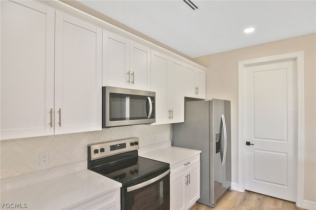 1906 NW 28th AVE, Cape Coral, FL 33993